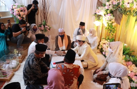 Taati Protokol Kesehatan, HM Tauhid dan Alwis Nikahkan Anak