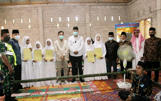 Bupati Sijunjung Hadiri Aqiqah dan Khatam Al-Qur’an di Nagari Kandang Baru