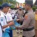 Kapolsek Lubeg Serahkan Bantuan Sembako untuk Anak Yatim Pelajar SMPN 6 Padang