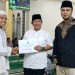 Tergabung Dalam TSR 1 Sijunjung, Dirut PDAM Tirta Sanjung Buana Serahkan Bantuan Saat Kunjungi Masjid Jami’ Baitul Makmur Mundam Sakti