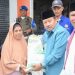 Bupati Agam Andri Warman Serahkan Bantuan Pangan pada 3028 KK di Ampek Angkek dan Canduang