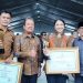 Bupati Dharmasraya Terima Penghargaan Upakarya Wanua Nugraha dari Kemendes RI