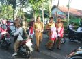 Pemkab Agam Bagikan Bendera Merah Putih Semarakkan HUT ke-81 RI